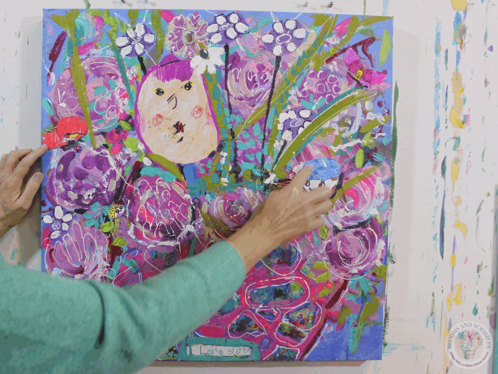 Studio workspace with floral acrylic painting in progress